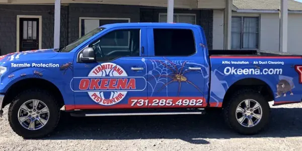 Okeena Termite and Pest company truck
