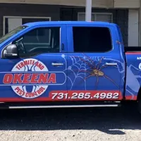 Okeena Termite and Pest company truck